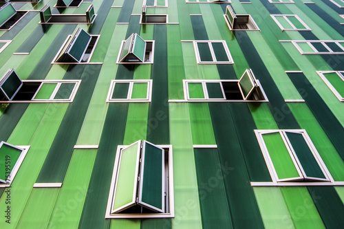 Building with open and closed windows