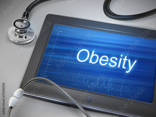 obesity word displayed on tablet