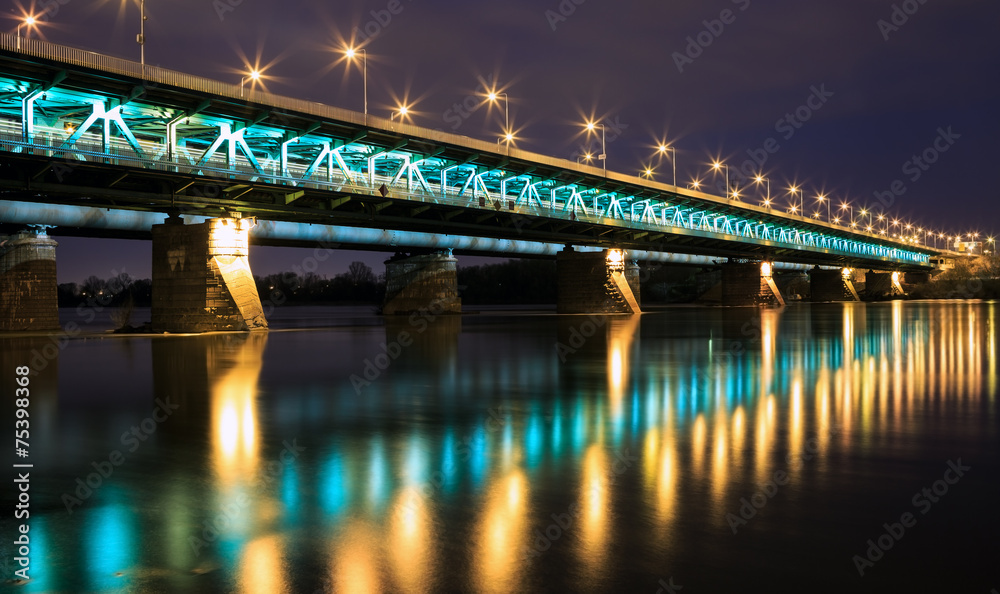 Highlighted bridge at night and reflected in the water.Bridge Gd - obrazy, fototapety, plakaty 