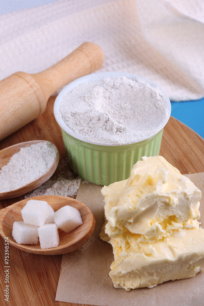 Components of cookies, on color wooden background Components of cookies, on color wooden background