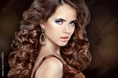 Beautiful fashion woman model with wavy long hair and fashion ea #75399502