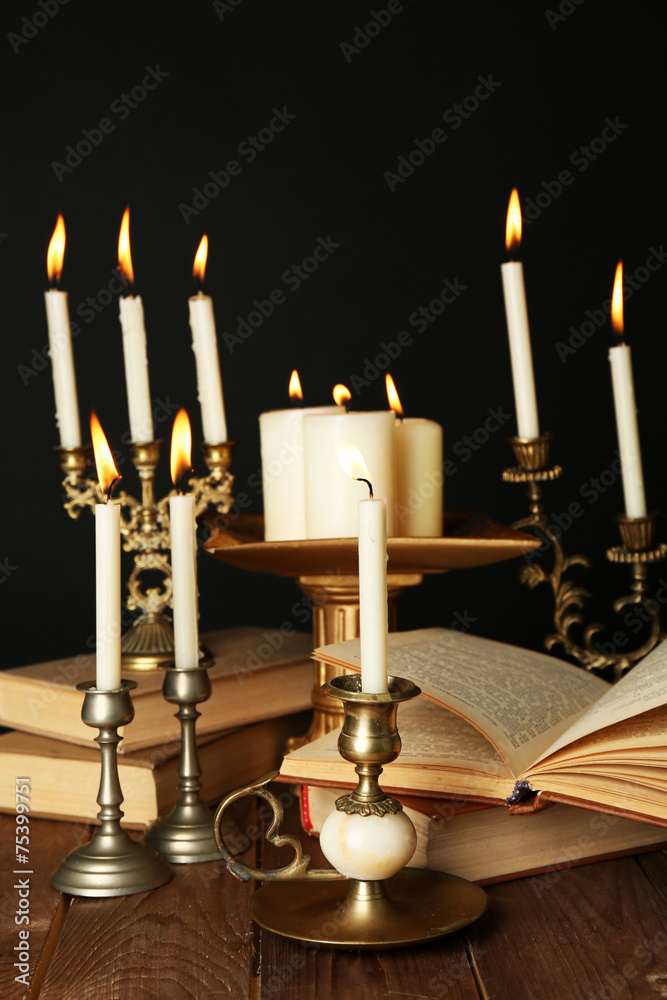 Retro candlesticks with candles and books, Retro candlesticks with candles and books,