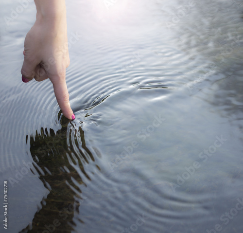 Finger and water