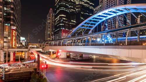Timelapse of traffic with light and color at Chong nonsi skywalk at night ,bangkok thailand photo
