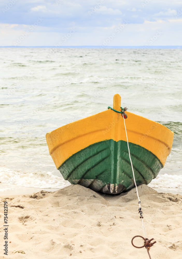 Wooden boat on The Baltic shore. Wooden boat on The Baltic shore.