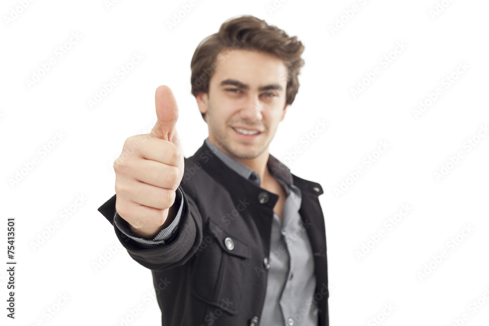 Young businessman showing OK sign with his thumb up Young businessman showing OK sign with his thumb up