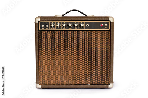 Brown electric guitar amplifier isolated on white background photo
