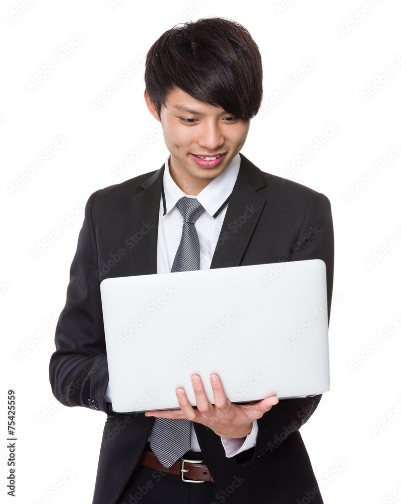 Businessman use of portable computer Businessman use of portable computer