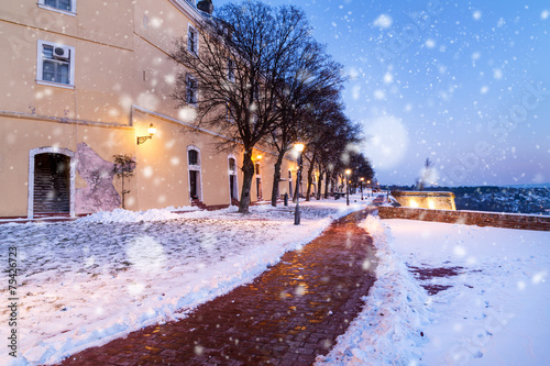 Winter scene with snow falling, shot at Petrovaradin Fortress photo