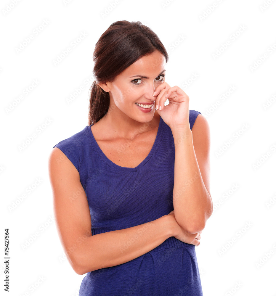 Shy young female looking at you smiling Shy young female looking at you smiling