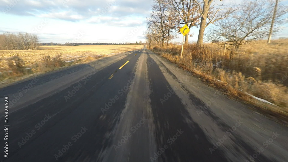 A POV (Point of View) drive with patches of light snow A POV (Point of View) drive with patches of light snow