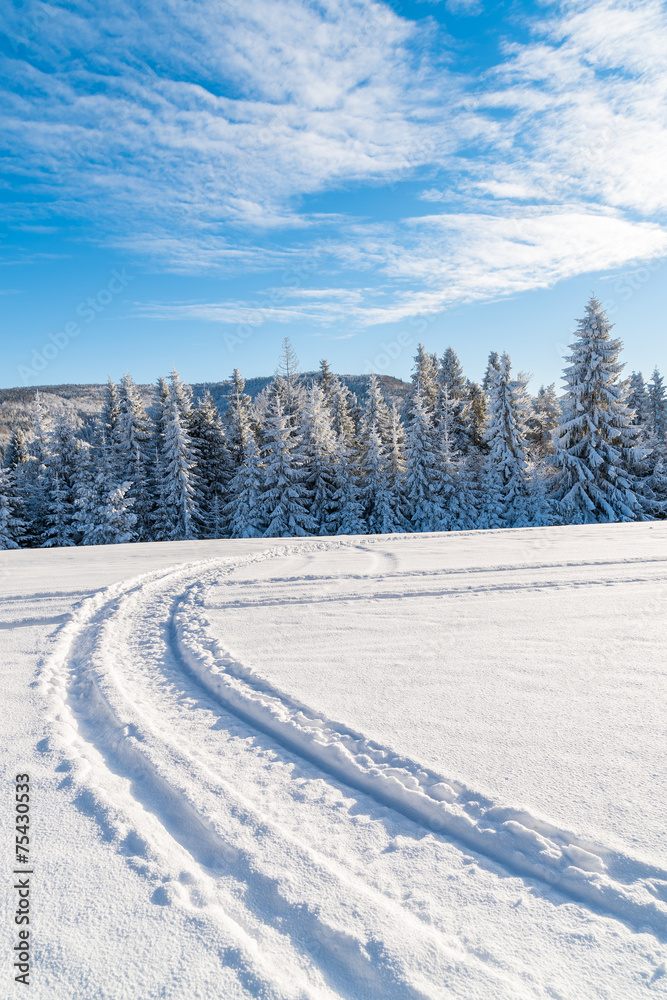 Winter road in Beskid Sadecki Mountains on sunny day, Poland Winter road in Beskid Sadecki Mountains on sunny day, Poland