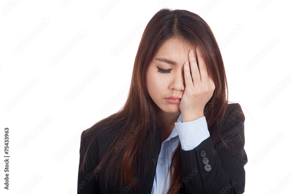Young Asian businesswoman got headache Young Asian businesswoman got headache