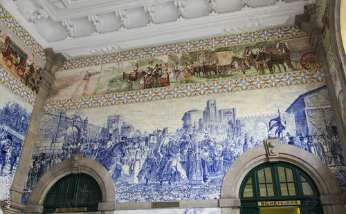 Azulejo panel in Sao Bento Railway Station in Porto, Portugal photo