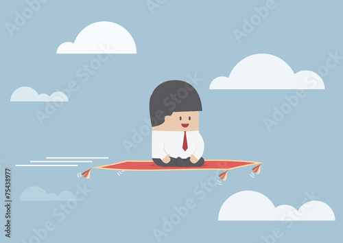 Businessman sitting on the flying carpet