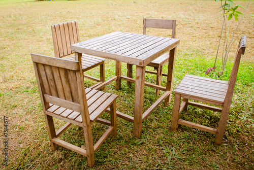 old wooden table and chairs outdoors