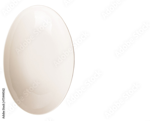 Empty white oval salad bowl over white background 