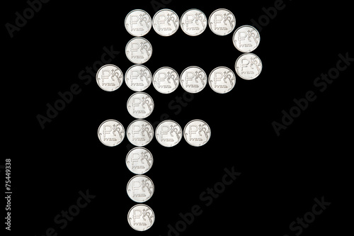 Russian ruble symbol made of coins