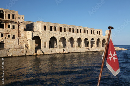 Former Lazzaretto Isolation hospital and Maltese flag photo