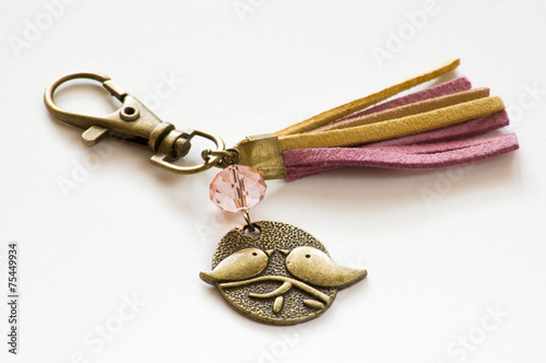 Keychain made with gold color metal and thong photo