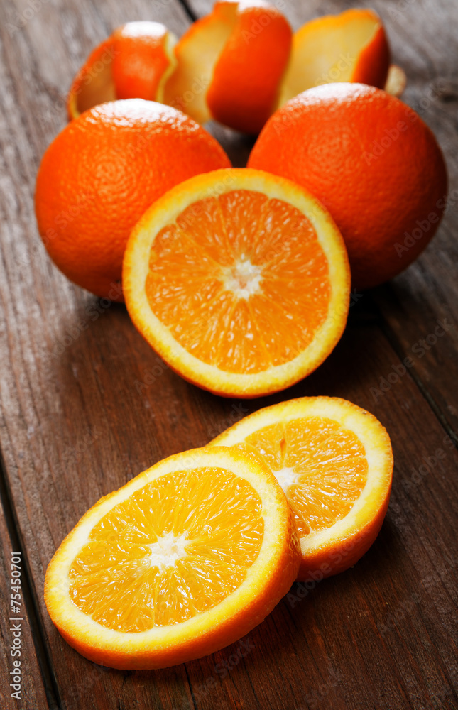 Group of oranges on a wooden table Group of oranges on a wooden table