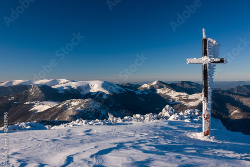 Sunny winter morning on a mountain ridge photo