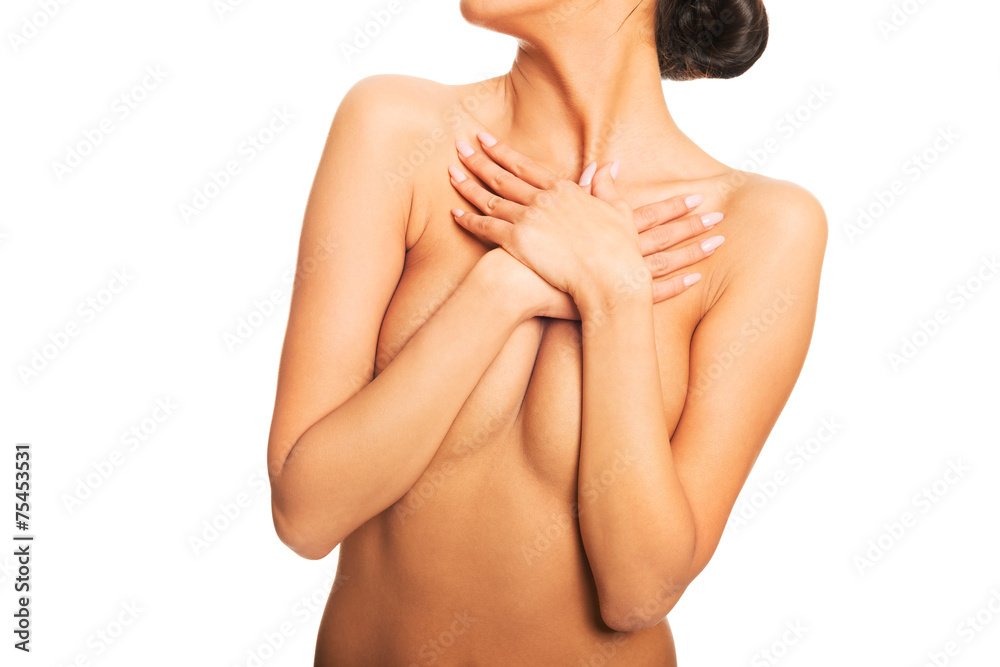 Fototapeta premium Slim nude woman covering her breast