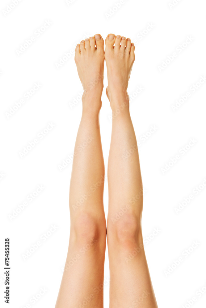 Foto de Front view of female nude slim legs up do Stock | Adobe Stock