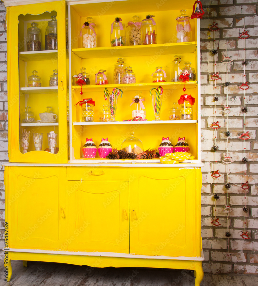 Colorful bright yellow welsh dresser