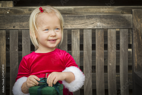 Adorable Little Girl Unwrap...