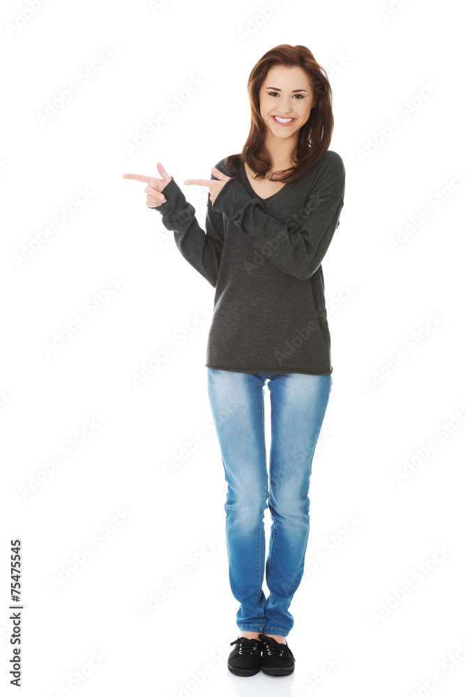 Student woman showing copyspace Student woman showing copyspace