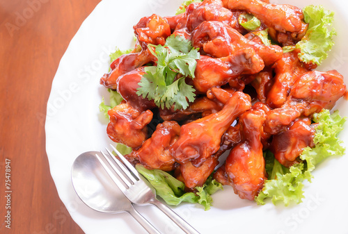 Chicken wings with red sauce
