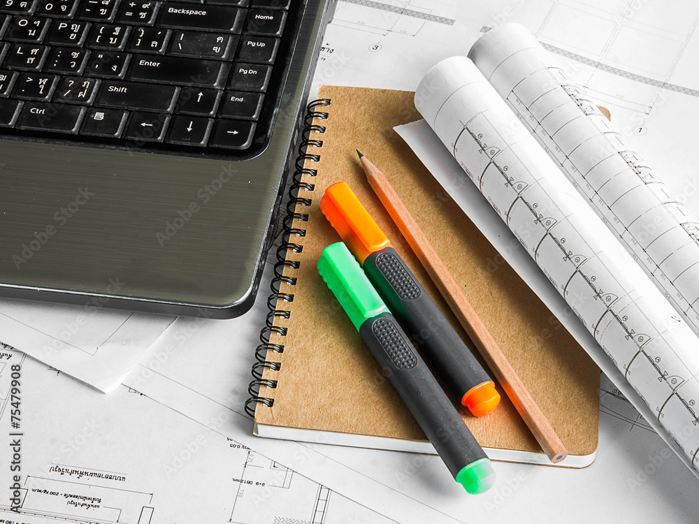 Architectural blueprint of office building with a pencil ,notebo Architectural blueprint of office building with a pencil ,notebo