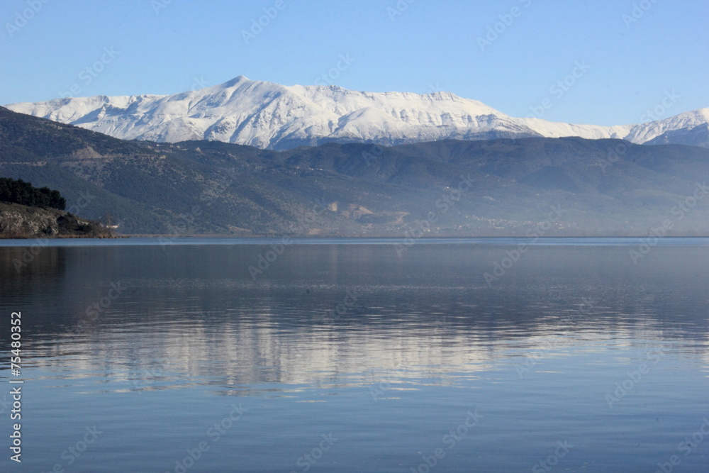 Lake with snow mountain reflection Lake with snow mountain reflection