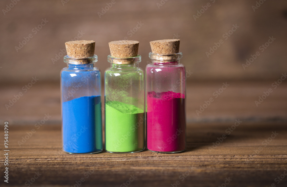 Glass bottles filled with coloured powder Glass bottles filled with coloured powder