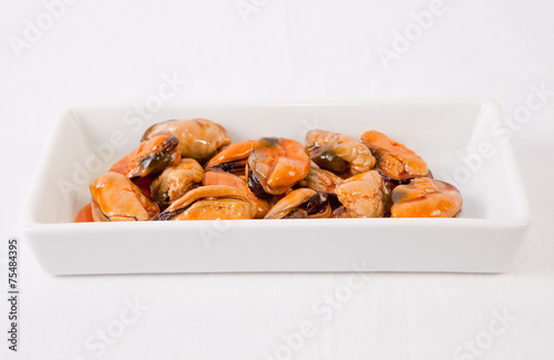 Tapa of marinated mussels photo