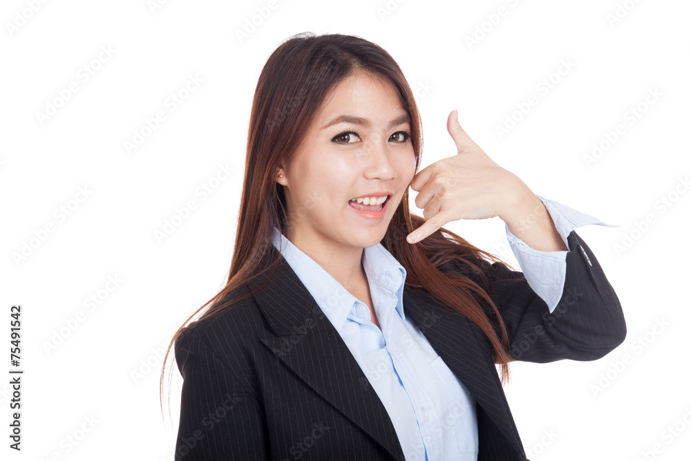 Young Asian businesswoman gesturing phone call Young Asian businesswoman gesturing phone call