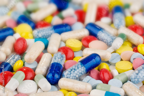 Color pills and capsules background