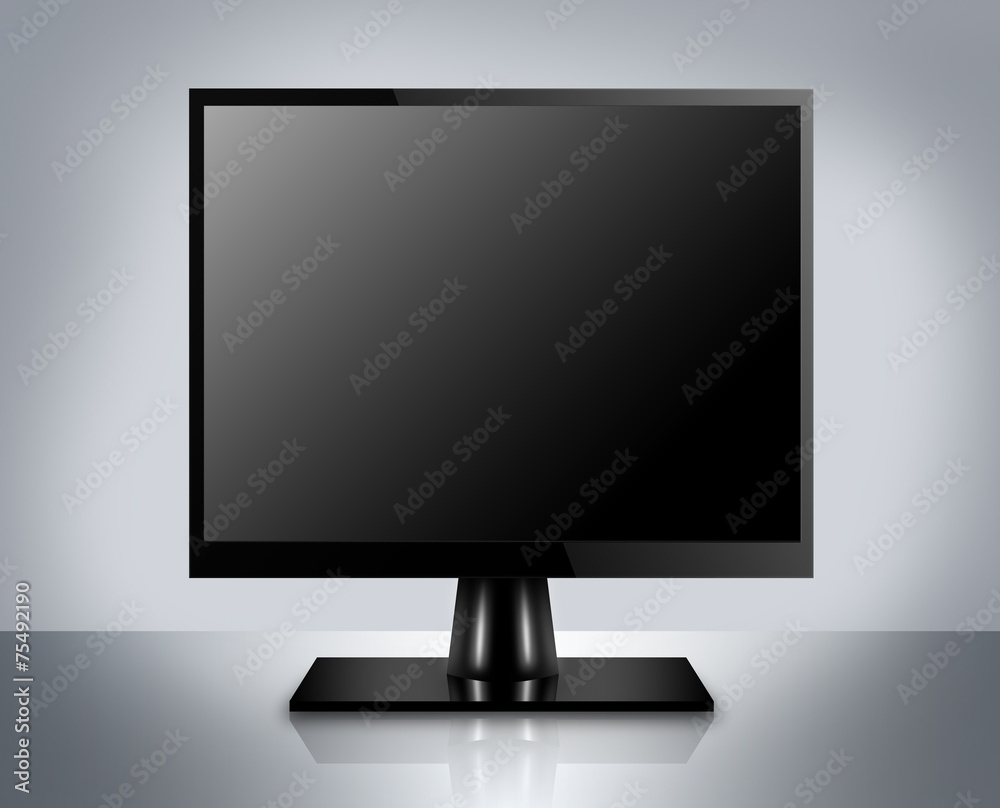 Modern LCD computer monitor on reflective background Modern LCD computer monitor on reflective background
