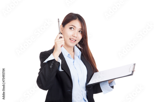 Fotografie Young Asian businesswoman with clipboard  get an idea