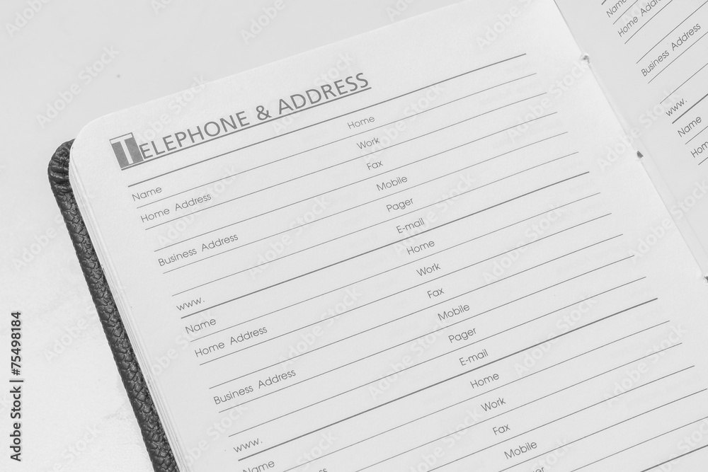 Closeup Empty Paper Telephone and Address Book Closeup Empty Paper Telephone and Address Book