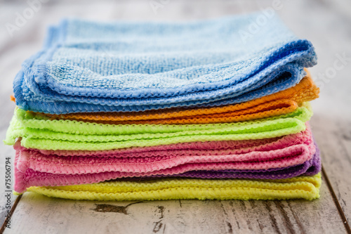 Pile of Colorful Napkins on White Wooden Background