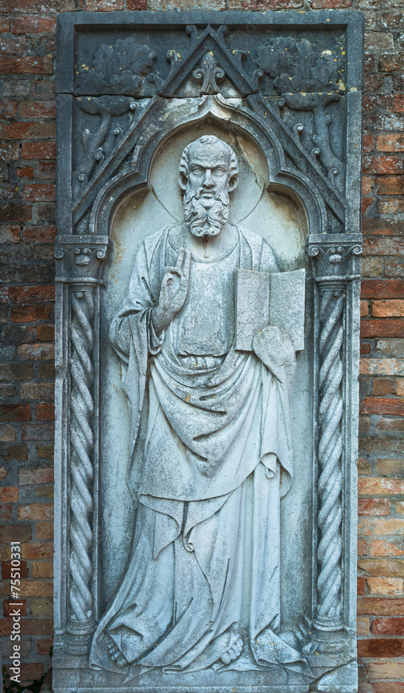 Stone statue of a saint, Torcello island, Venice, Italy
