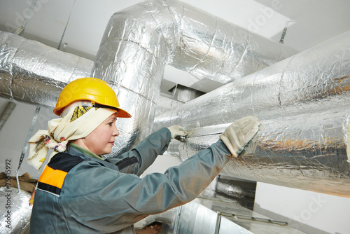 Fényképezés female insulation worker