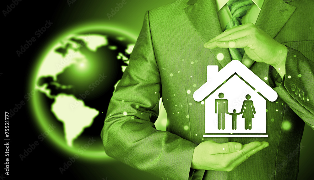 businessman protecting family in home with hands businessman protecting family in home with hands