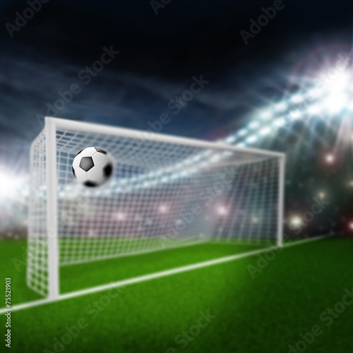soccer ball flies into the goal