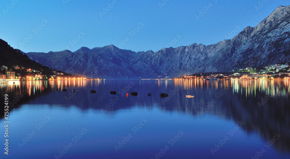 Night view of Kotor Bay with mountains