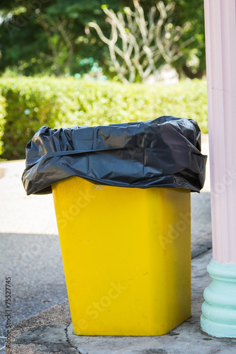 yellow recycle bin