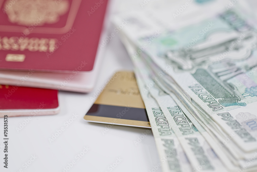 passport, large banknotes and gold credit card passport, large banknotes and gold credit card