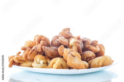 sweet pastry deep fried and sprinkled photo